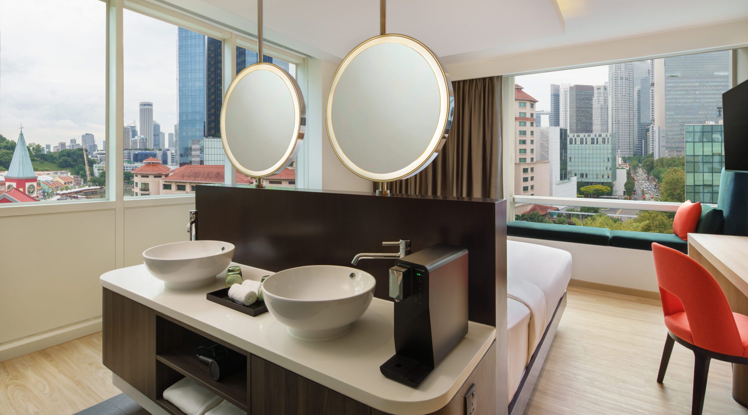 A back-angle perspective from the bathroom of the Regis Room Studio Suite King Bedroom at Park Regis by Prince